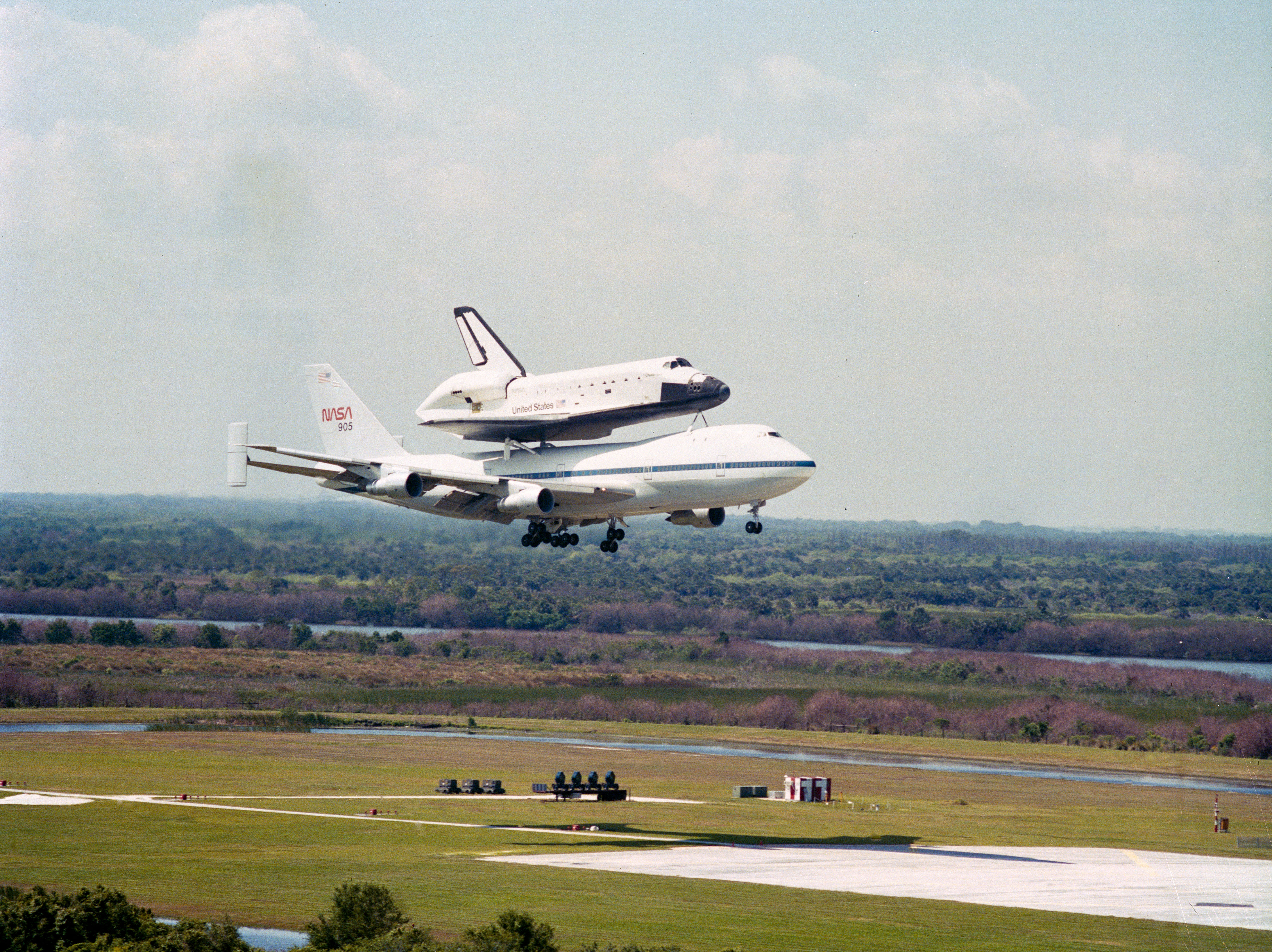 Space shuttle Challenger arrives back at NASA's Kennedy Space Center in Florida atop a Shuttle Carrier Aircraft