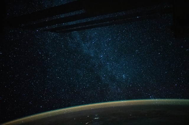 iss060e022358 (Aug. 4, 2019) --- The Milky Way lights up an orbital night pass as the International Space Station orbited 257 miles above the Coral Sea in between Australia and Papua New Guinea. The atmospheric glow highlights Earth's limb below.