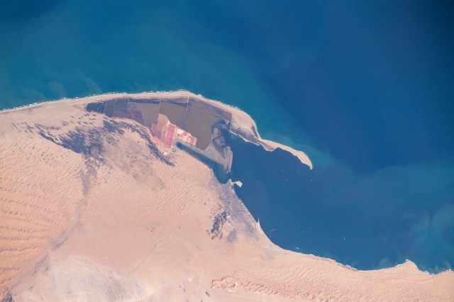 iss060e006368 (July 10, 2019) --- The Namibian port town of Walvis Bay on the Atlantic coast is pictured from 262 miles above as the International Space Station began a southeastern orbital trek across Africa.