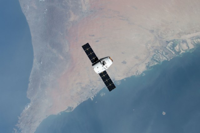 iss060e015864 (July 27, 2019) --- The SpaceX Dragon space freighter approaches the International Space Station as both spacecraft were orbiting 260 miles above the United Arab Emirates.