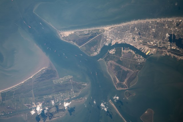 iss060e054125 (Sept. 4, 2019) --- The cities of Galveston and Bolivar Peninsula, separated by the Galveston Bay with the Texas City Dike at bottom, were pictured from the International Space Station as it orbited 262 miles above the Lone Star State.