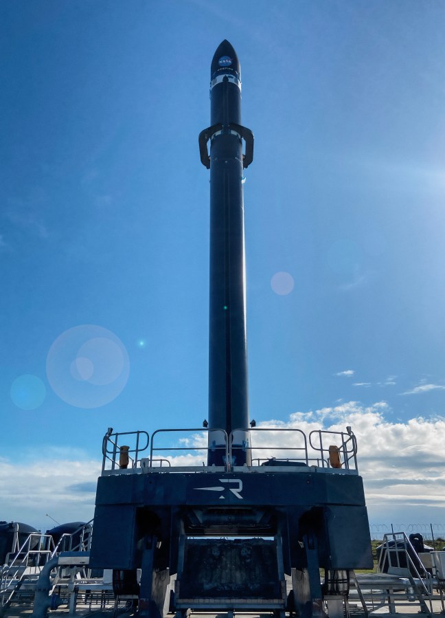 Rocket Lab’s Electron rocket called “Ready, Aim, PREFIRE” is vertical on the pad in Mahia, New Zealand ahead of launching the first of two PREFIRE CubeSats on May 25, 2024.