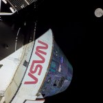 On the 19th day of the Artemis I mission, the Moon grows larger in frame as Orion prepares for the return powered flyby on Dec. 5, when it will pass approximately 79 miles above the lunar surface. This image includes both the Orion crew module and service module, connected by the compression pad that utilizes the 3D-MAT material.