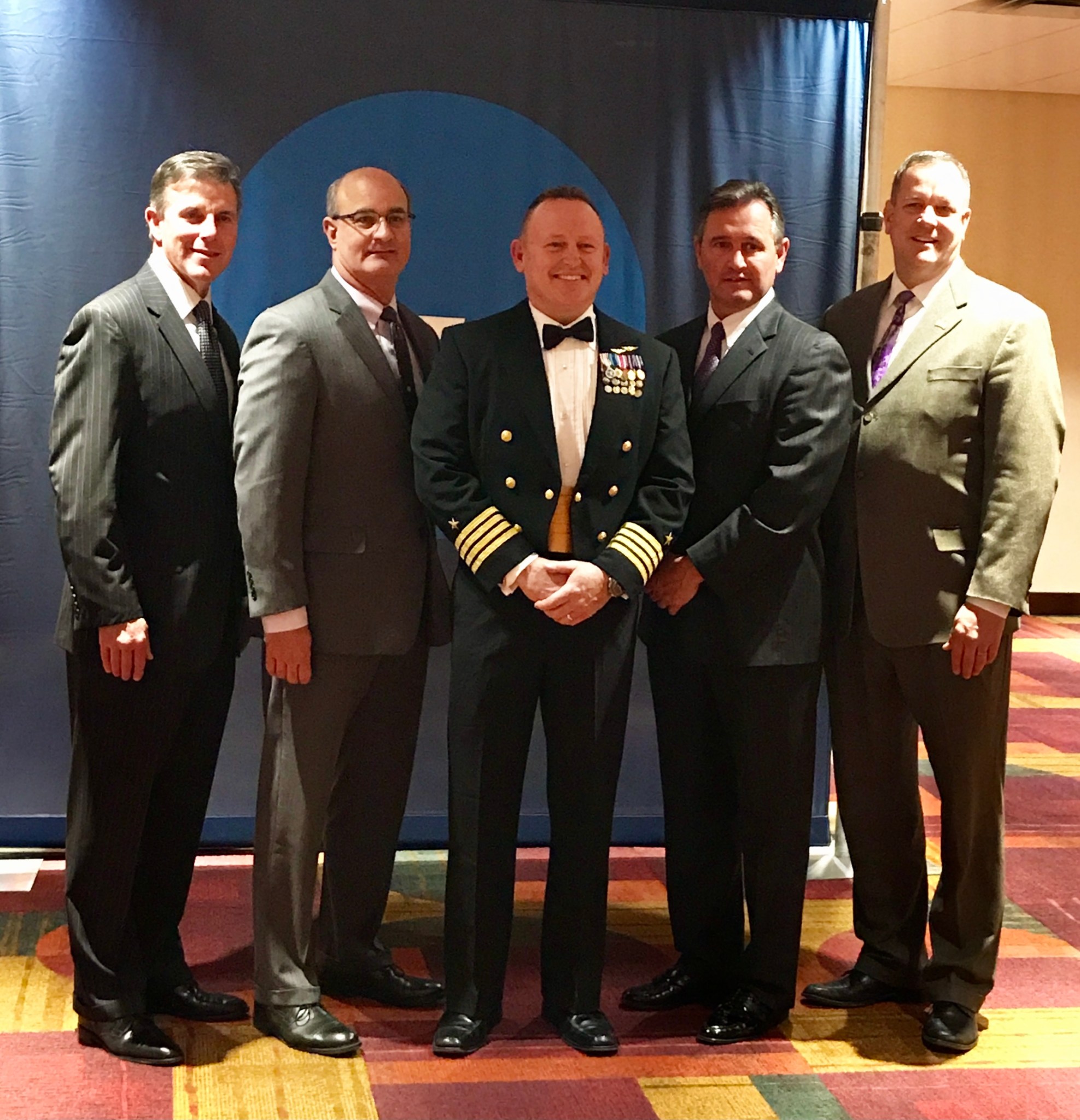 Billy Stover and Butch Wilmore pose during Second from left, Billy Stover poses next to Butch Wilmore, middle, during Theodore Roosevelt award ceremony in January 2018