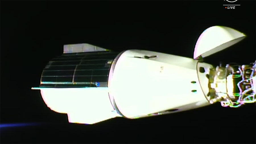 The SpaceX Dragon Endeavour spacecraft is pictured moments away from undocking from the Harmony module's forward port on the International Space Station. Credit: NASA TV