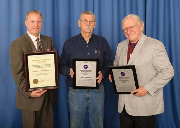 Inventors David Stewart and Daniel Leiser accept their awards for TUFROC at the ARC Tech Transfer Ceremony with NASA ARC Chief Counsel Thomas W. Berndt.