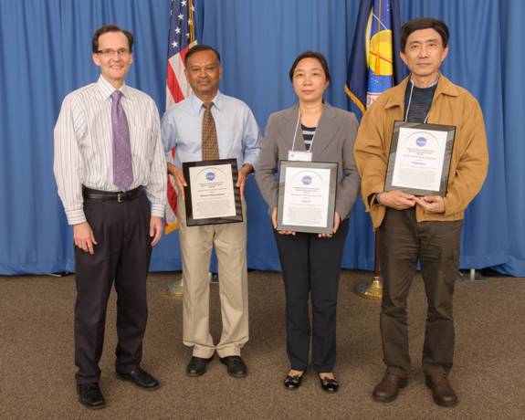 Inventors Meyya Meyyappan, Jing Li, Yijiang Lu accept their awards for the 2012 Government Invention of the Year Award from NASA Ames Chief Patent Counsel Robert Padilla.