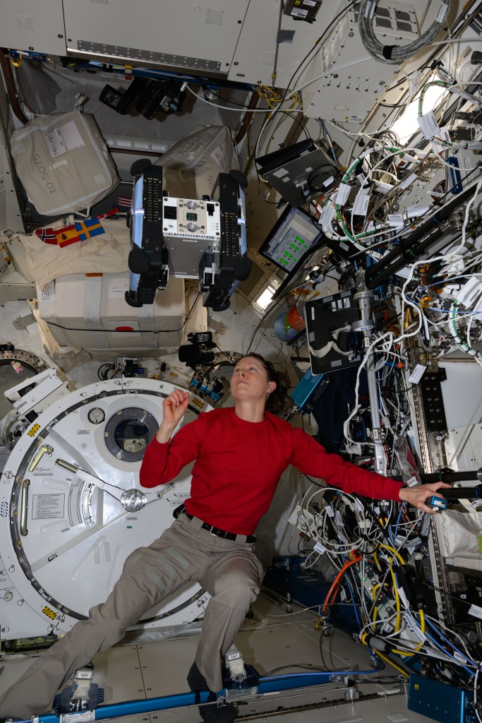 NASA astronaut and Expedition 71 Flight Engineer Tracy C. Dyson monitors a free-flying Astrobee robotic assistant inside the International Space Station's Kibo laboratory module. The Astrobee was being tested ahead of the Astrobee-Zero Robotics competition for students on Earth to write software that controls the cube-shaped, toaster-sized device on the orbital lab.