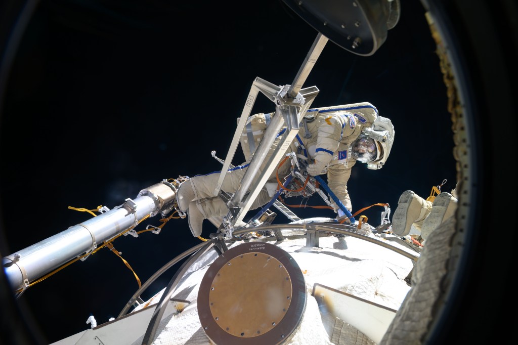 Cosmonaut Nikolai Chub is pictured outside of the International Space Station wearing his Orlan spacesuit during a four-hour and 36-minute spacewalk. He worked on the Russian segment of the complex completing the deployment of one panel on a synthetic radar communications system. He also installed equipment and experiments to analyze the level of corrosion on station surfaces and modules.