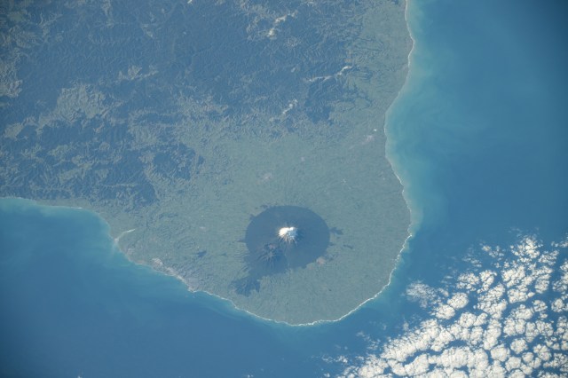 New Zealand's Egmont National Park hosts the dormant volcano, Mount Taranaki, in this photgraph from the International Space Station as it orbited 264 miles above the Tasman Sea.