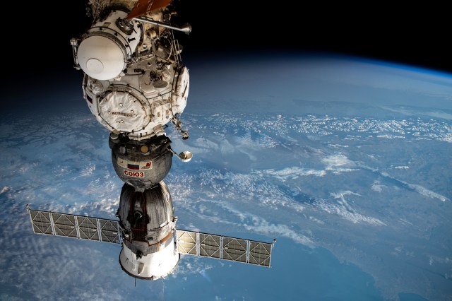 (From bottom to top) The Soyuz MS-25 crew ship is pictured docked to the Prichal docking module which is itself attached to the Nauka science module. Extending from Nauka is its science airlock that can be used to place science experiments outside in the external microgravity environment. The International Space Station was orbiting 266 miles above the South Atlantic Ocean off the coast of Argentina when this photograph was taken.