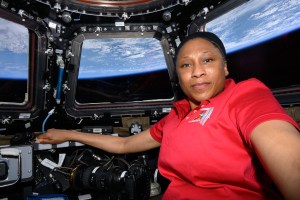Expedition 71 Flight Engineer and NASA astronaut Jeanette Epps poses for a portrait inside the seven-window cupola, the International Space Station's "window to the oworld," while orbiting 259 miles above Greece.