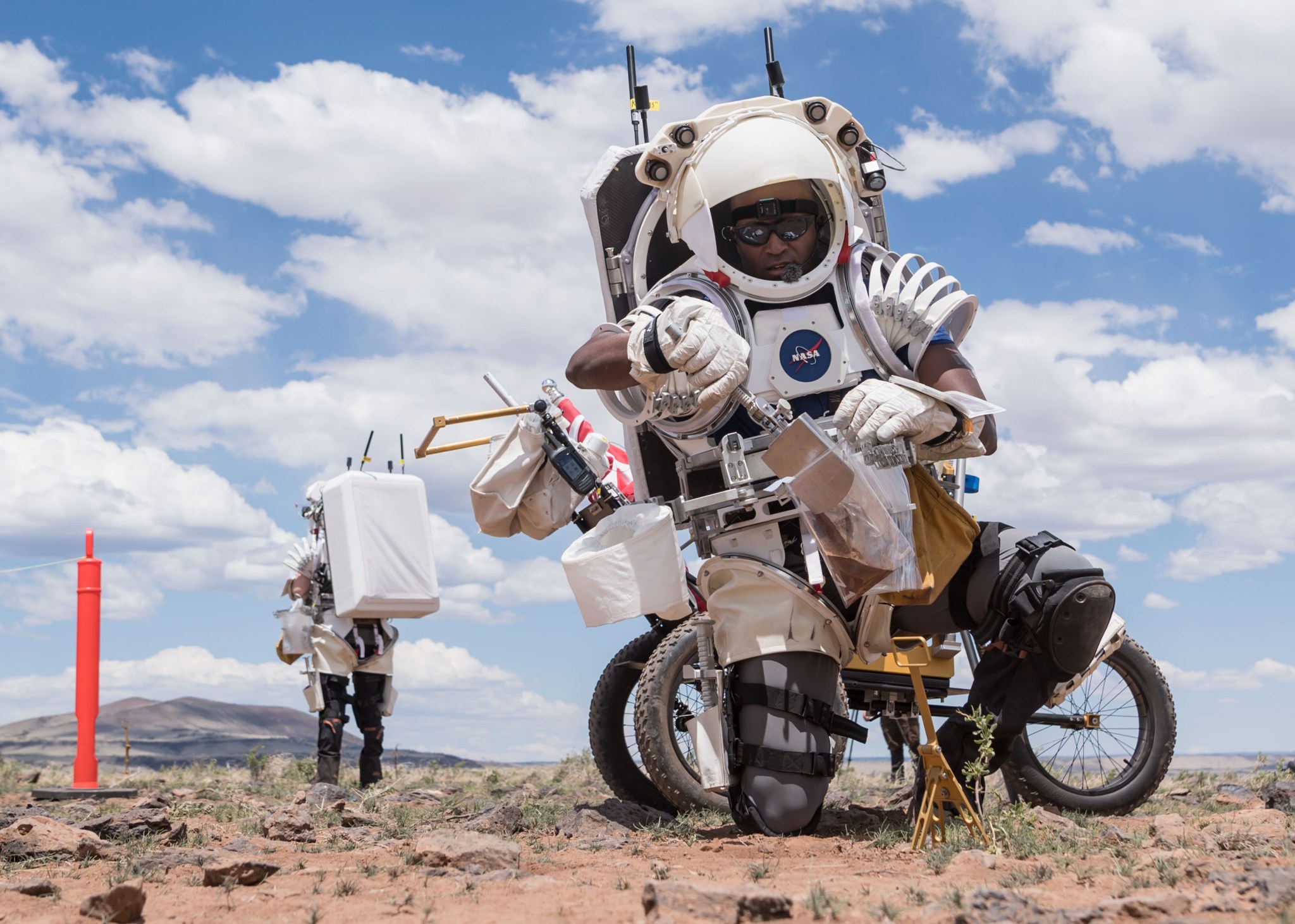 NASA astronaut Andre Douglas collects soil samples during the first in a series of four simulated moonwalks in Arizona.