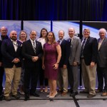 Astronaut Victor Glover, far right, and Bill Hill, second from right, director of safety and mission assurance at NASA’s Marshall Space Flight Center join Marshall honorees for a photo op at the Space Flight Awareness Honoree Ceremony on May 4 in Orlando, Florida. Honoree awards recognize civil servants and industry partners for outstanding work and dedication to astronaut safety. From left, Cody Goodman, David Starrett, John Ivester, Lisa Hughes, Greg Snell, Megan Vansant, Megan Hines, Karl Nelson, Les Johnson, Shawn Reagan, Hill, and Glover. Marshall honorees also include Maggie Freeman, who was unable to attend the awards event.