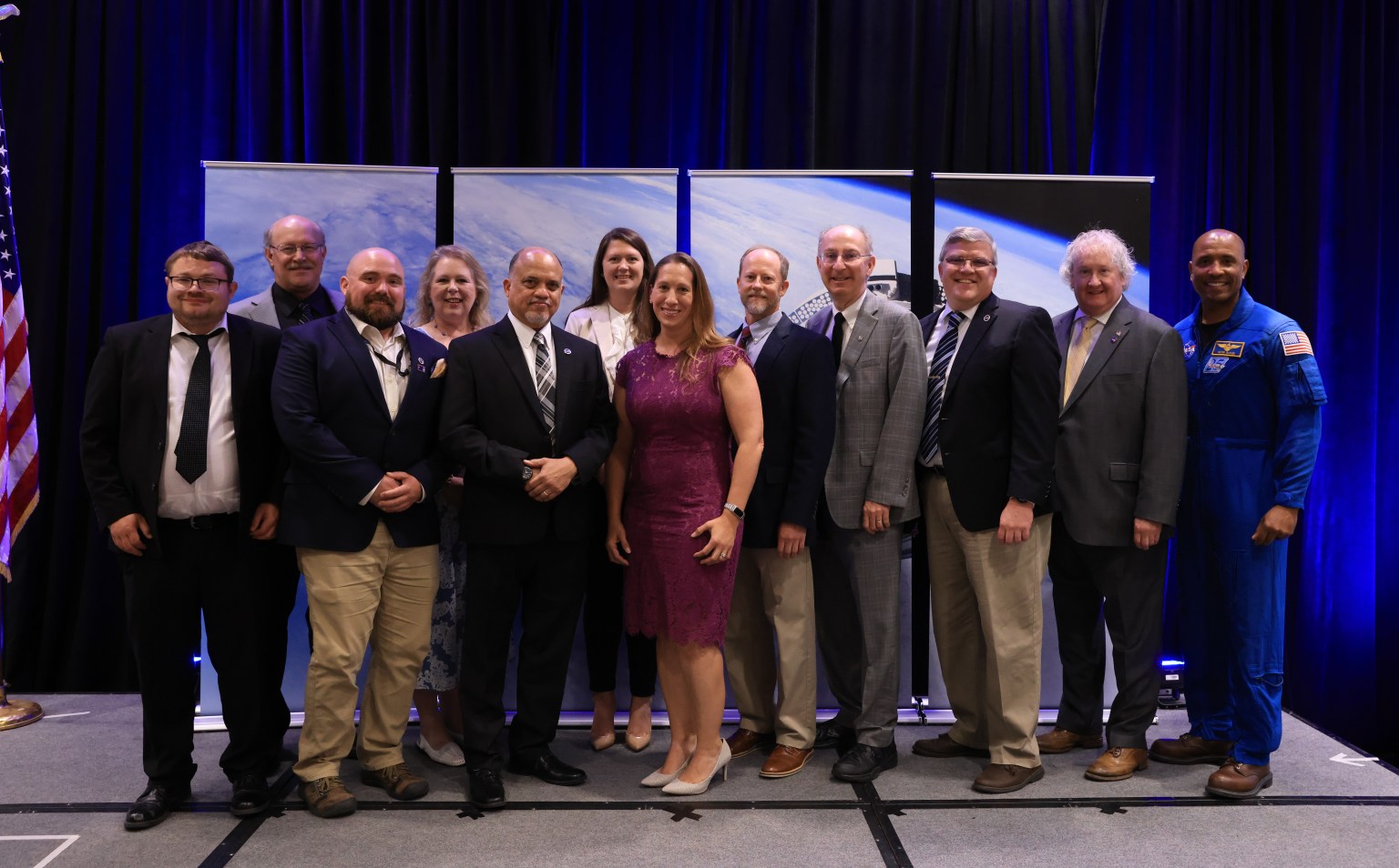 Astronaut Victor Glover, far right, and Bill Hill, second from right, director of safety and mission assurance at NASA’s Marshall Space Flight Center join Marshall honorees for a photo op at the Space Flight Awareness Honoree Ceremony on May 4 in Orlando, Florida. Honoree awards recognize civil servants and industry partners for outstanding work and dedication to astronaut safety. From left, Cody Goodman, David Starrett, John Ivester, Lisa Hughes, Greg Snell, Megan Vansant, Megan Hines, Karl Nelson, Les Johnson, Shawn Reagan, Hill, and Glover. Marshall honorees also include Maggie Freeman, who was unable to attend the awards event.