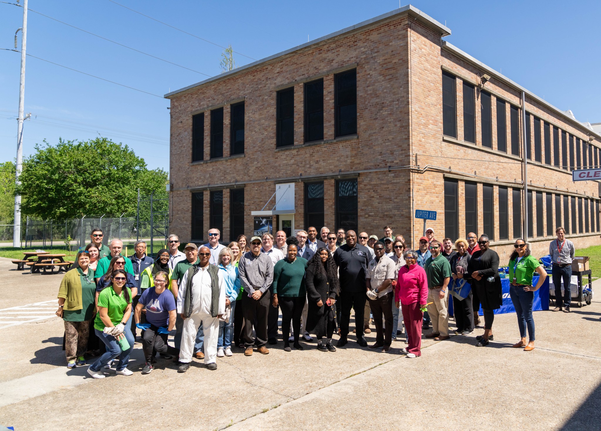 Nearly 50 employees from NASA, Boeing, Lockheed Martin, Syncom Space Services (S3), Textron, and various other contractors worked together to weed flower beds and pick up litter and debris around the 829-acre site on Earth Day.