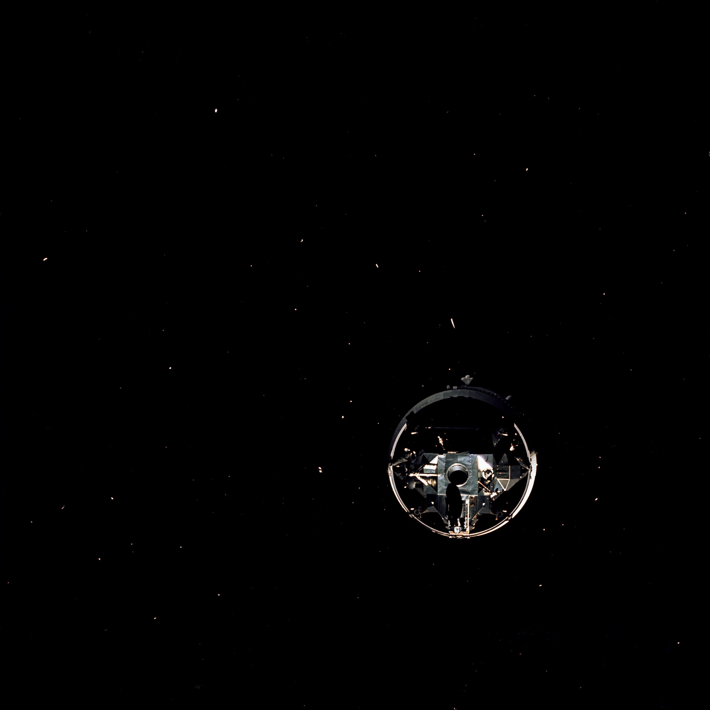 The Lunar Module Snoopy still attached to the S-IVB third stage during the Transposition and Docking maneuver