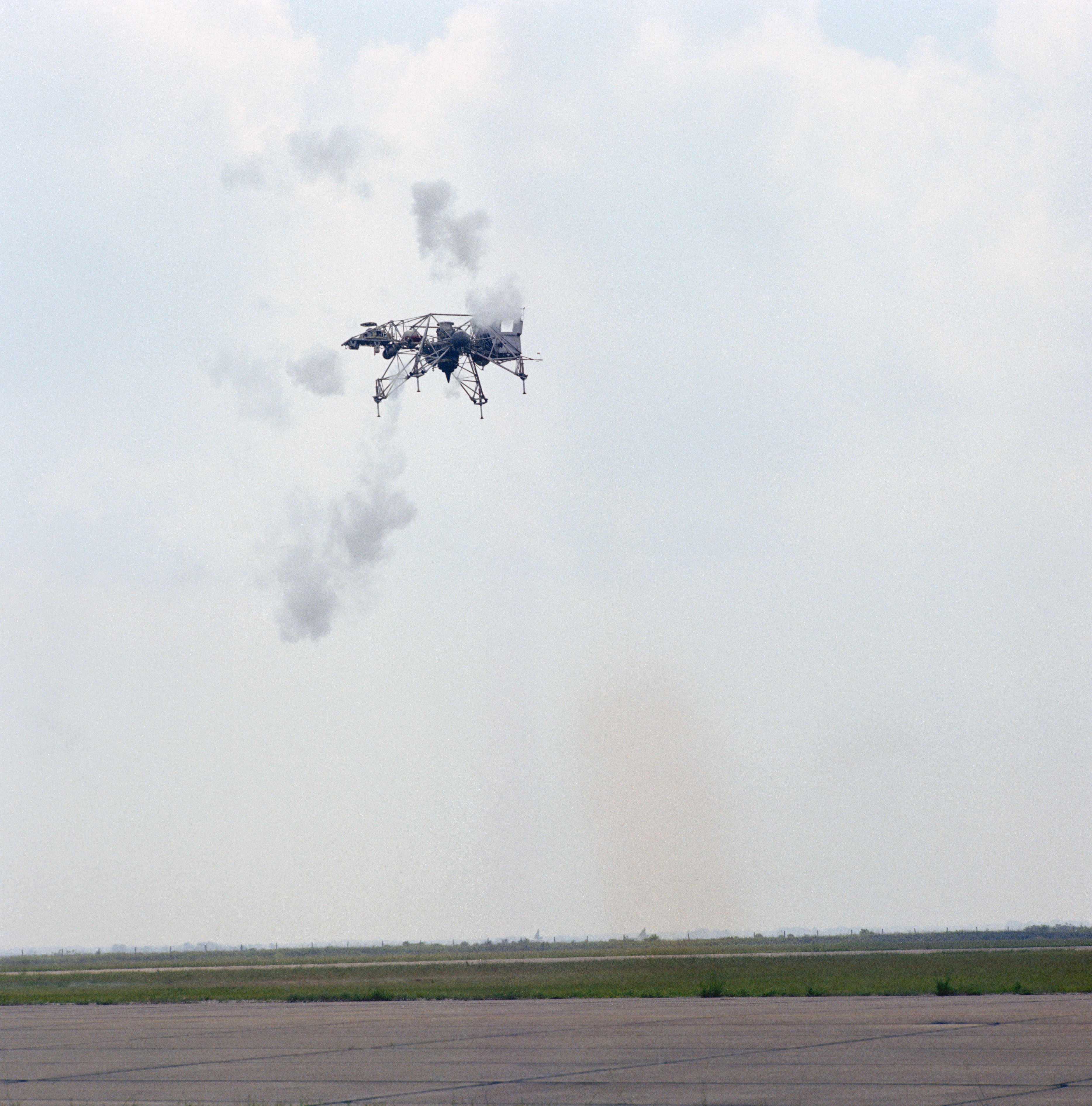 NASA test pilot Harold E. “Bud” Ream flies the Lunar Landing Training Vehicle at Ellington Air Force Base to certify it for astronaut operations