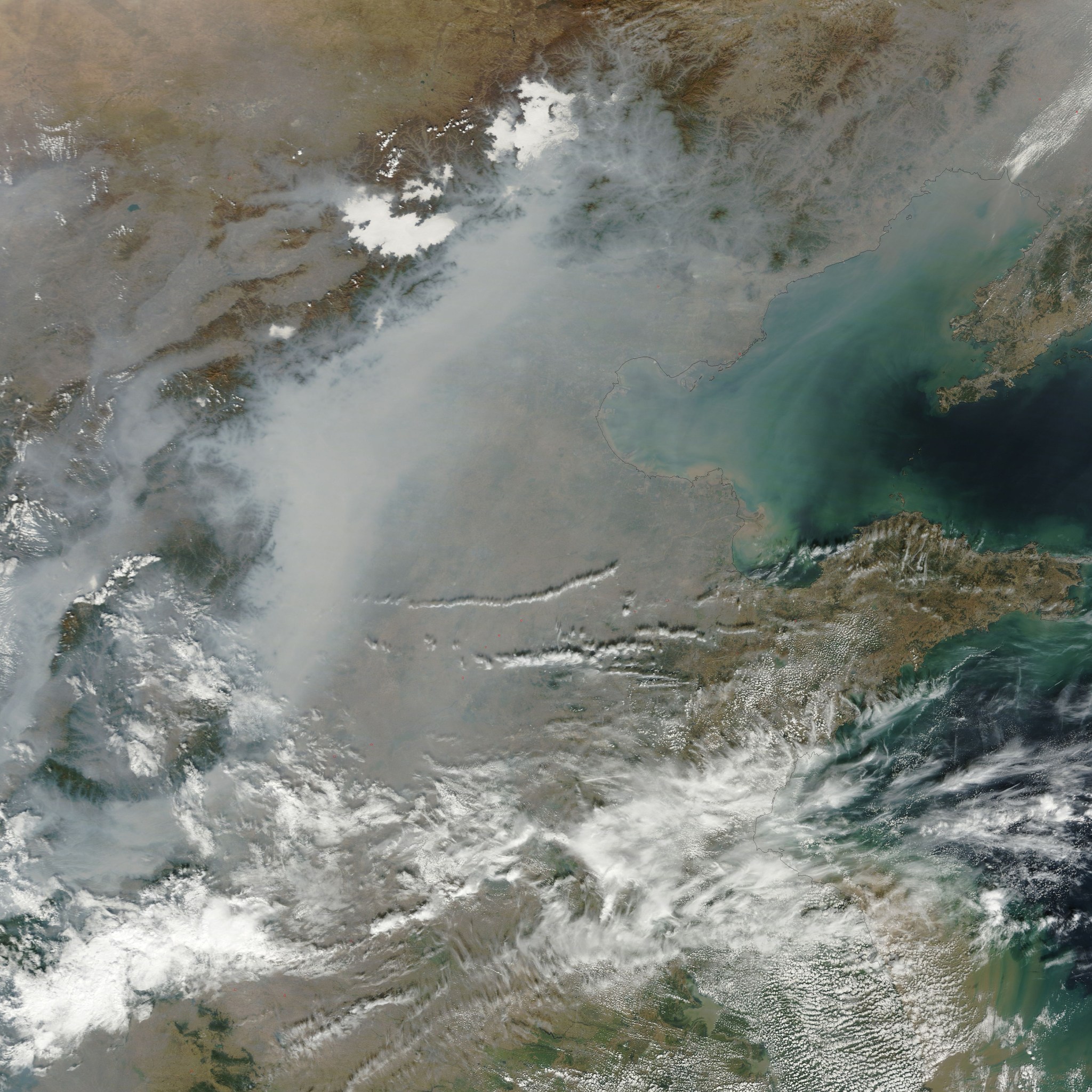 A haze covering Eastern China captured by the Moderate Resolution Imaging Spectroradiometer (MODIS) on NASA’s Terra satellite. On the day the image was captured, ground-based measurements reported PM 2.5 measurements of 334 micrograms per cubic meter of air.