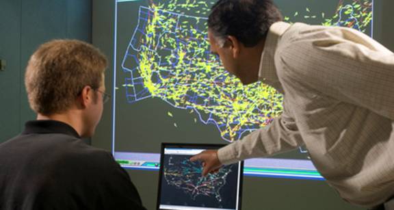 Shon Grabbe and Kapil Sheth discuss the traffic situation in the continental U.S. with the help of Future Air Traffic Management (ATM) Concepts Evaluation Tool (FACET). NASA is using these technologies to begin to understand the processes that affect the national airspace system.
