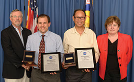 Ames Research Center Acting Deputy Center Director, Dr. Charles A. Smith, and Ames Inventions and Contributions Board Member, Mary Livingston, present David J. Kinney and Loc C. Huynh with the 2014 Agency Software of the Year Award for their Configuration-Based Aerodynamics (CBAERO) package.