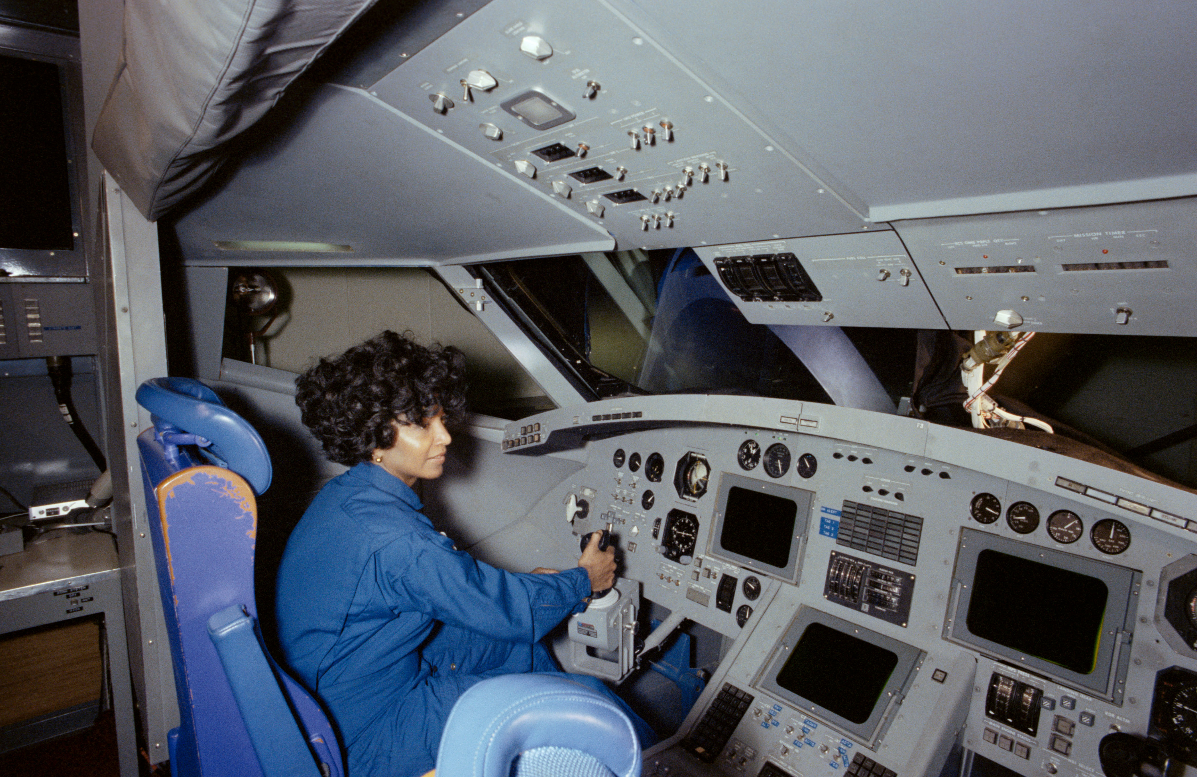 Nichols at the controls of the shuttle simulator