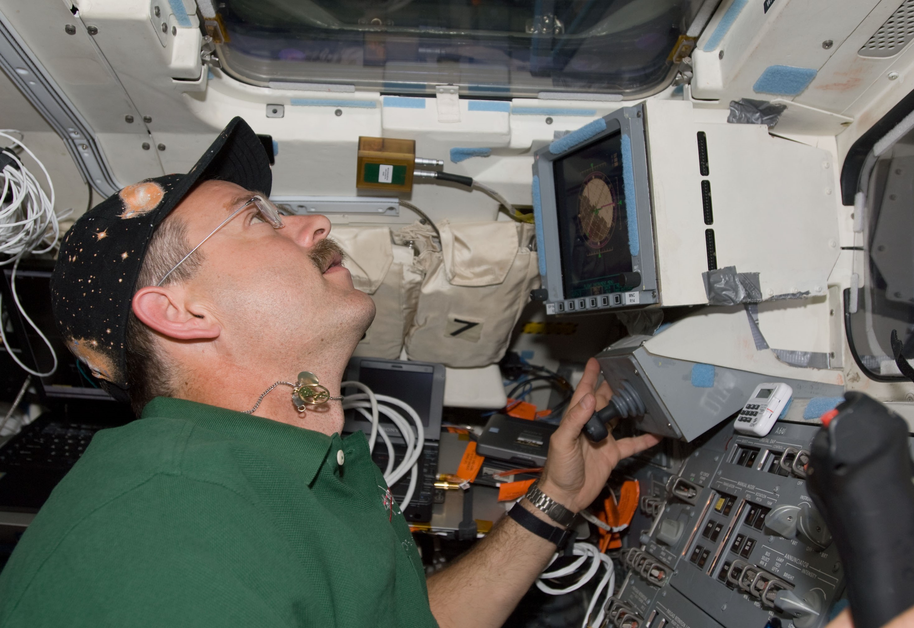 STS-125 Commander Scott D. Altman maneuvers Atlantis close to Hubble