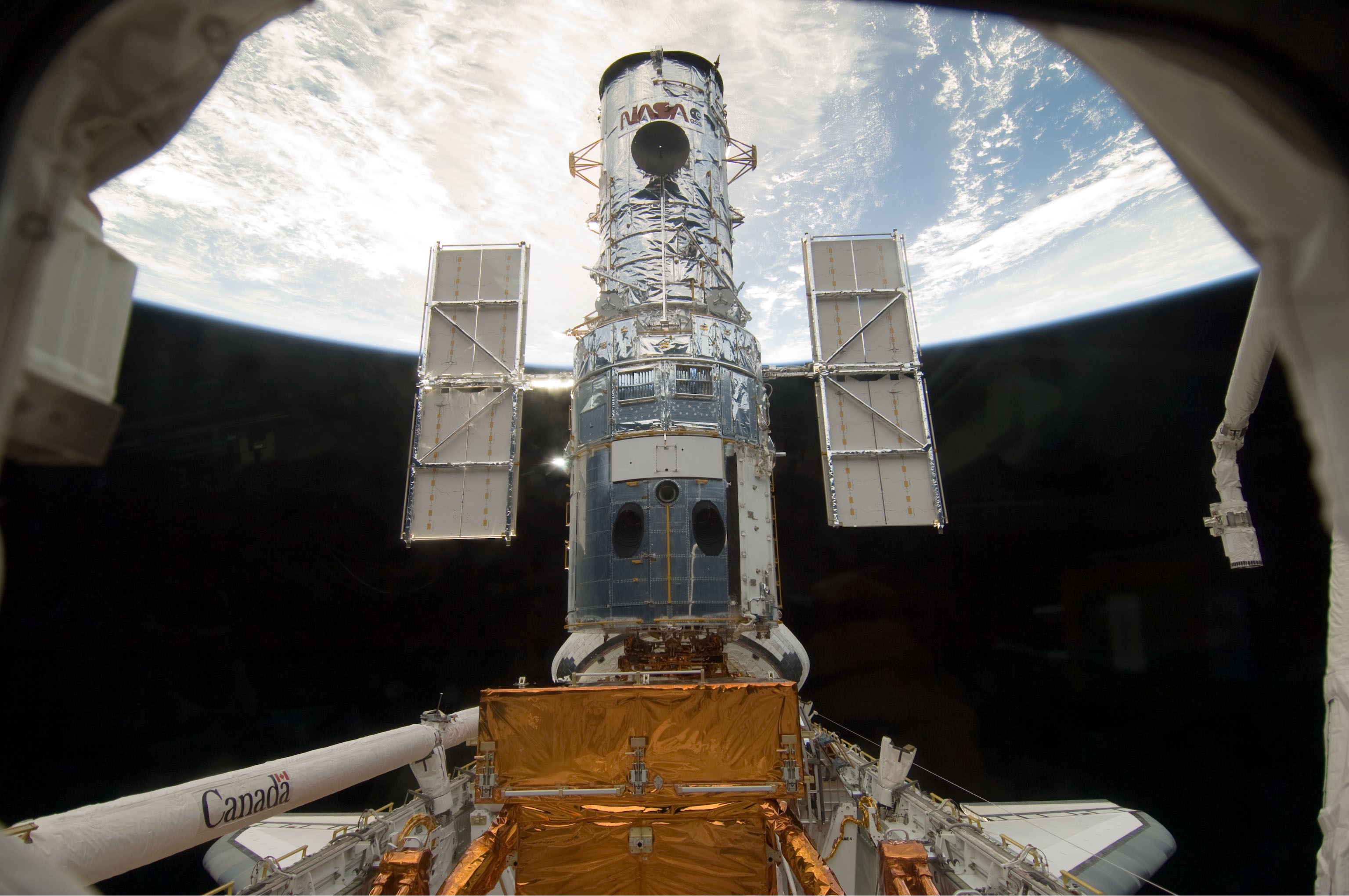 Hubble secured in Atlantis’ payload bay