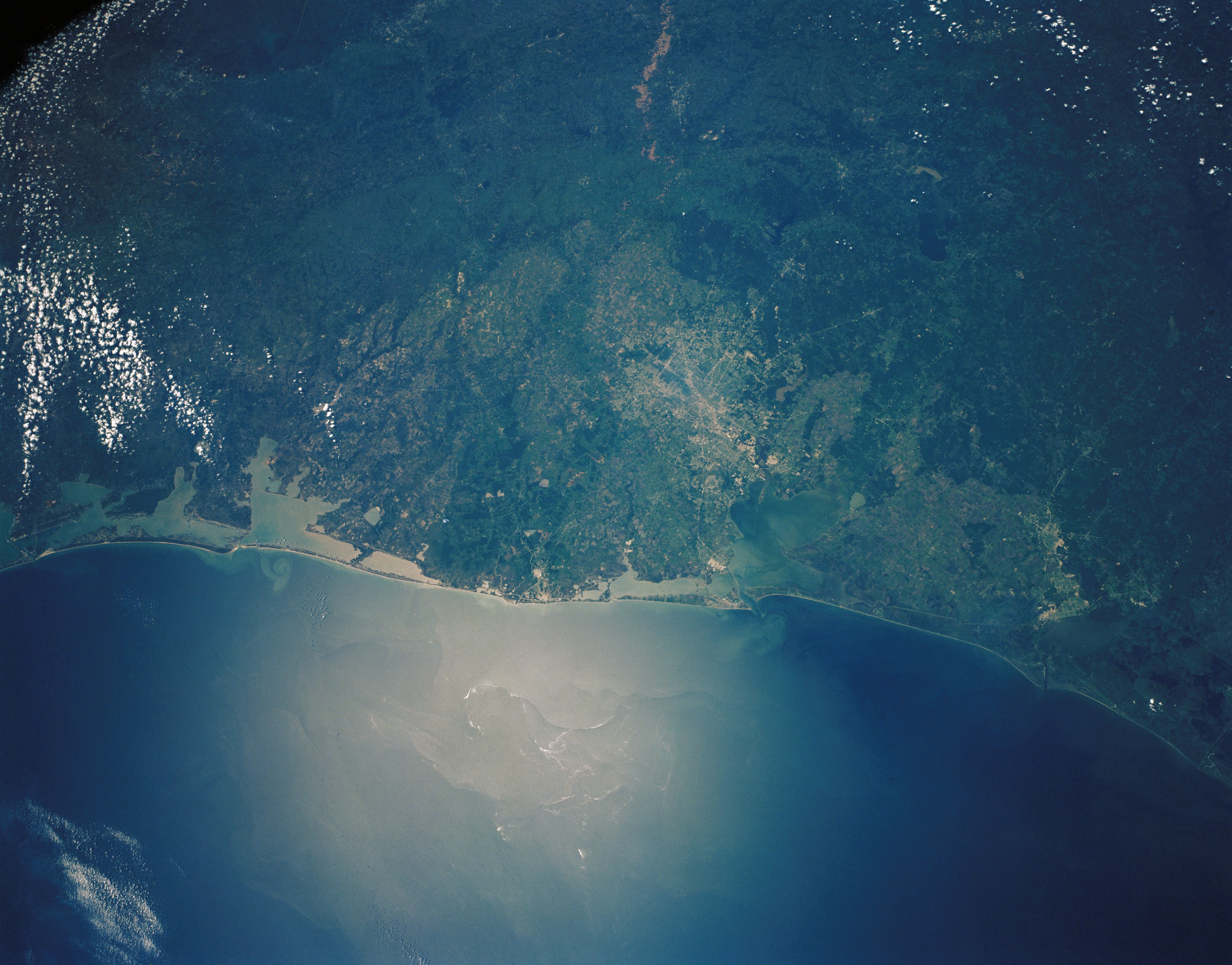 NASA Space Technology STS-30 crew Earth commentary photograph of the Texas Gulf Soar at the side of Houston