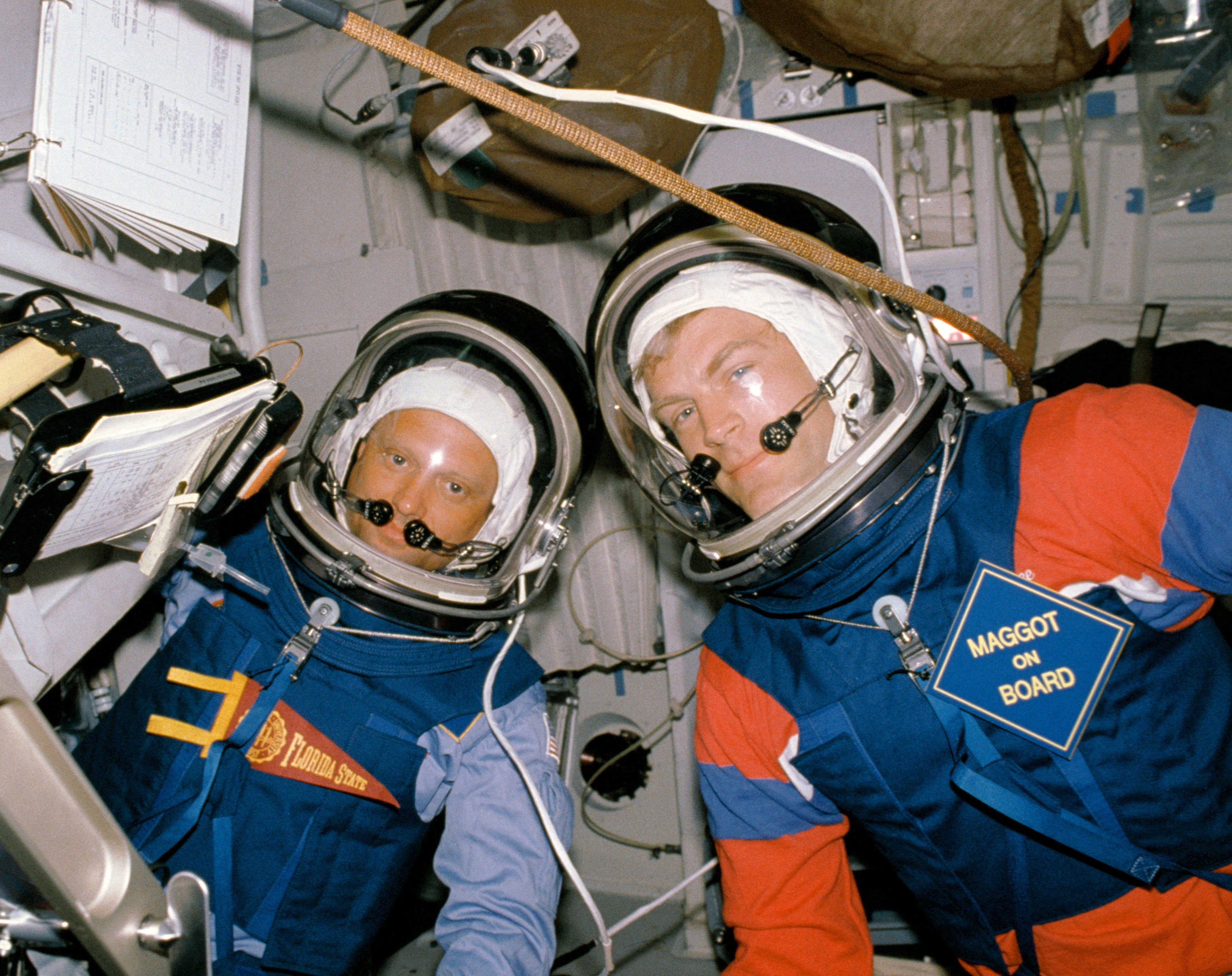 NASA Space Technology Norman E. Thagard, left, and Brand C. Lee all the way in which by the helmet retention assembly prebreathe take a look at