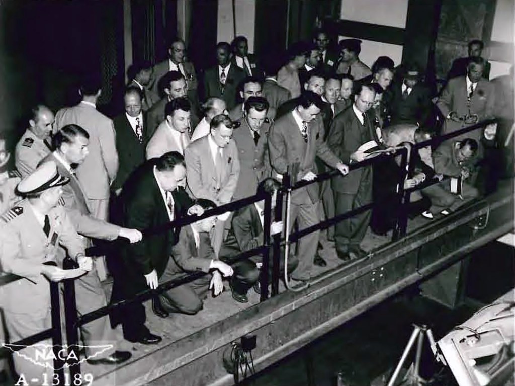 Group looking over railing.