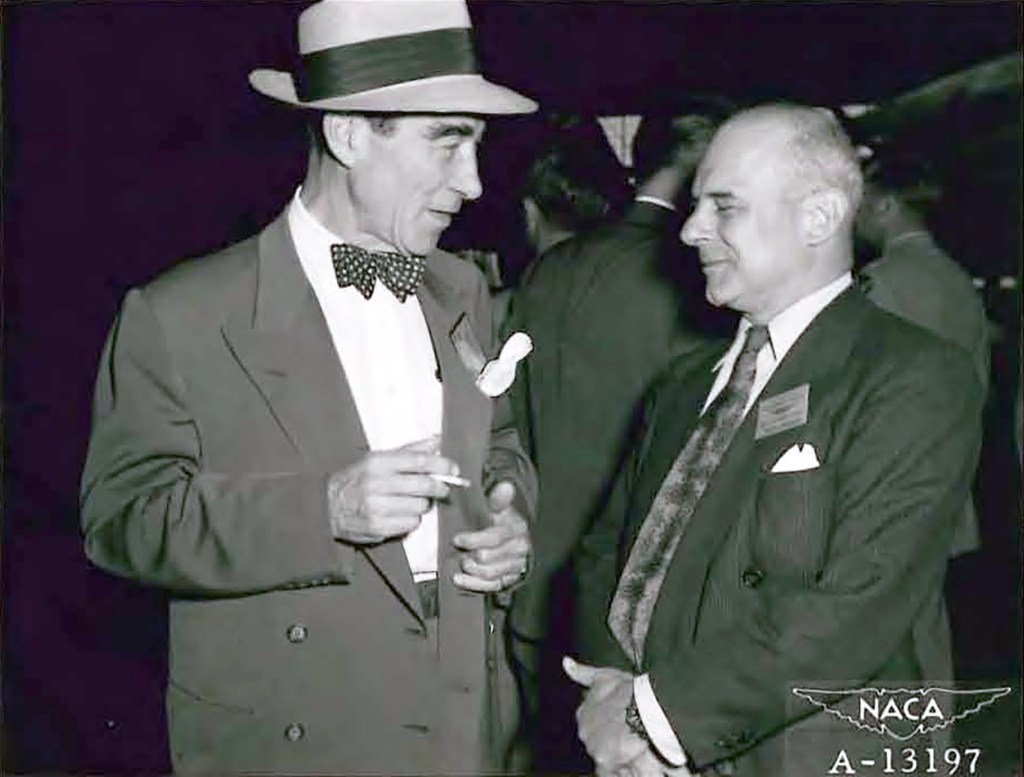 Two men talking.