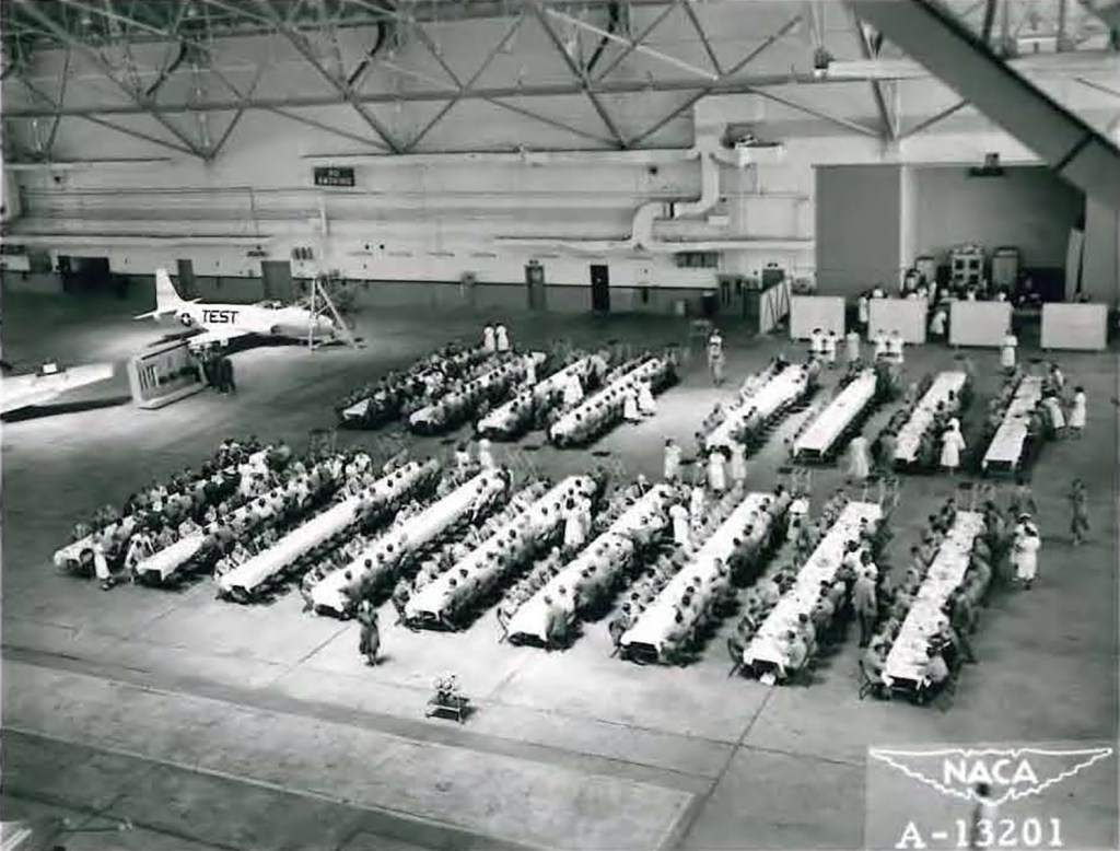 tables set up in hangar.