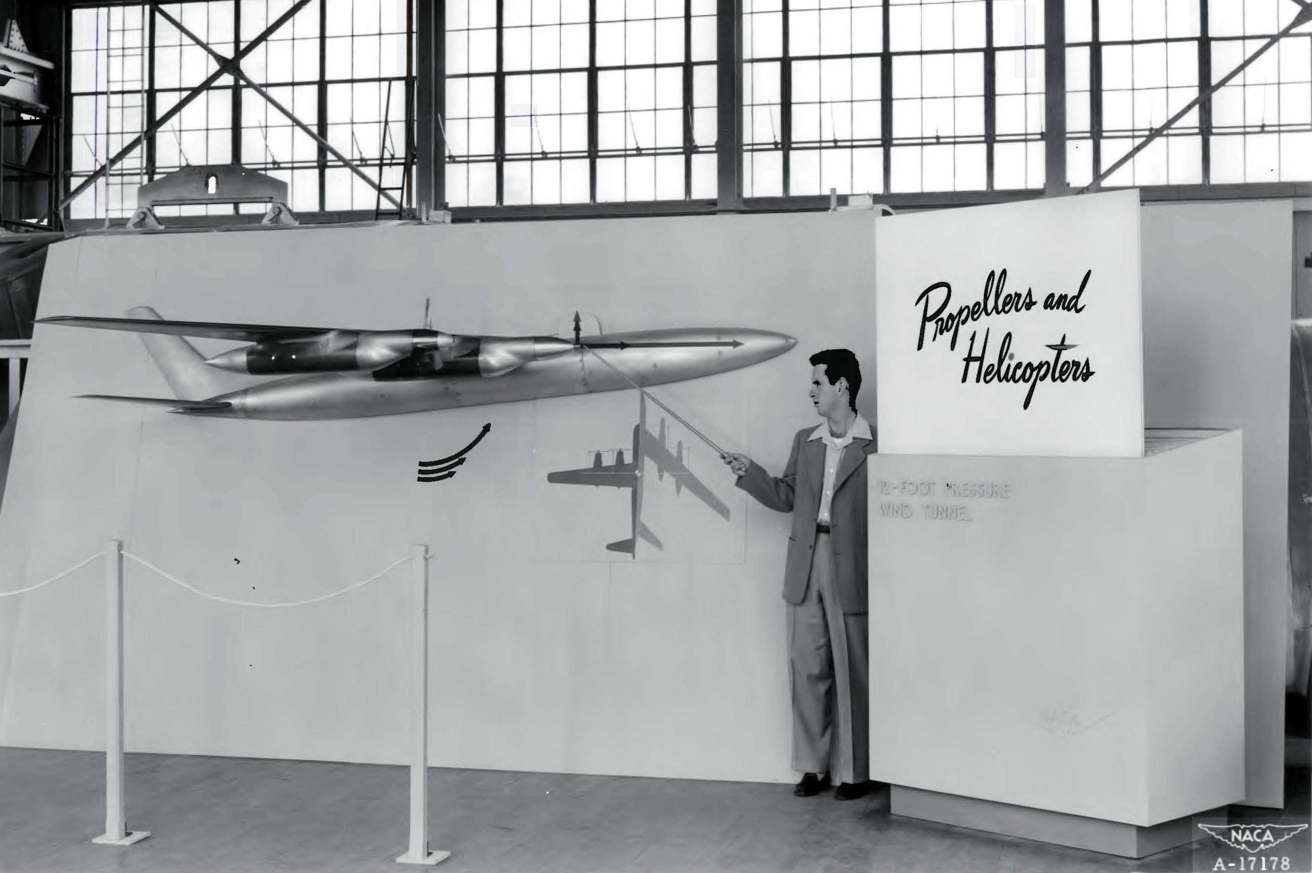 Man pointing to display.
