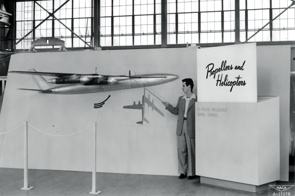 Man pointing to display.