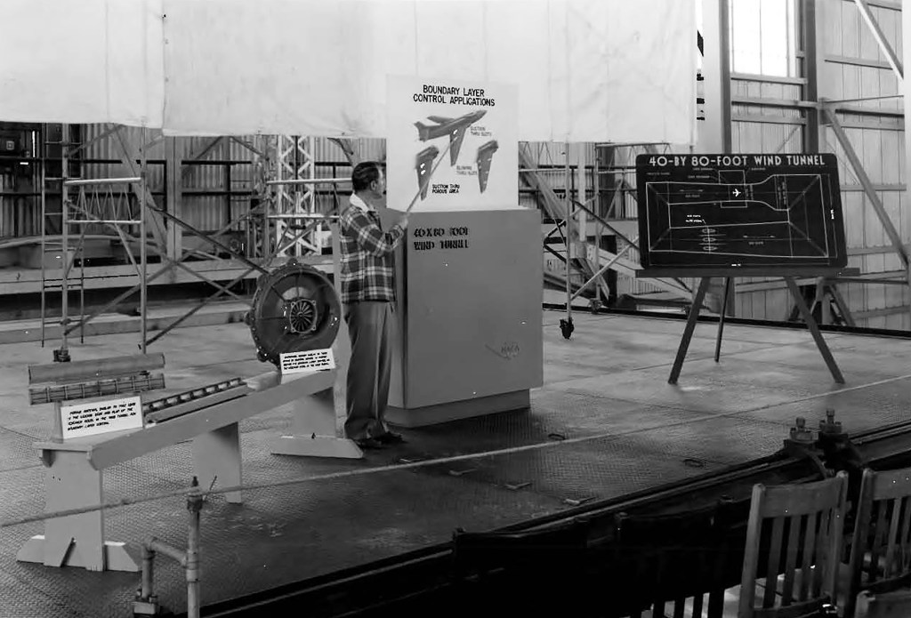 Man pointing to display.