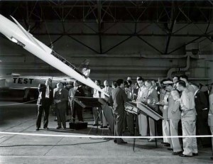 Group in hangar.