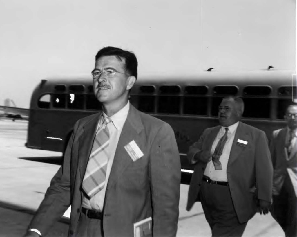 Men exiting bus.