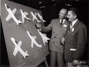 Two men looking at display.