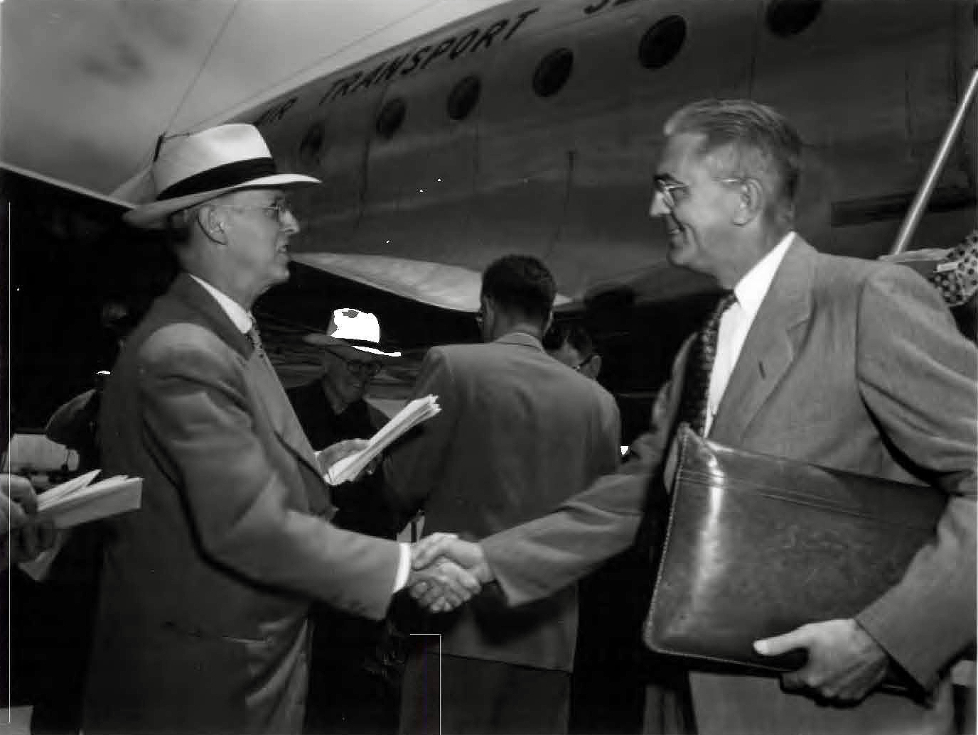 Two men shaking hands.