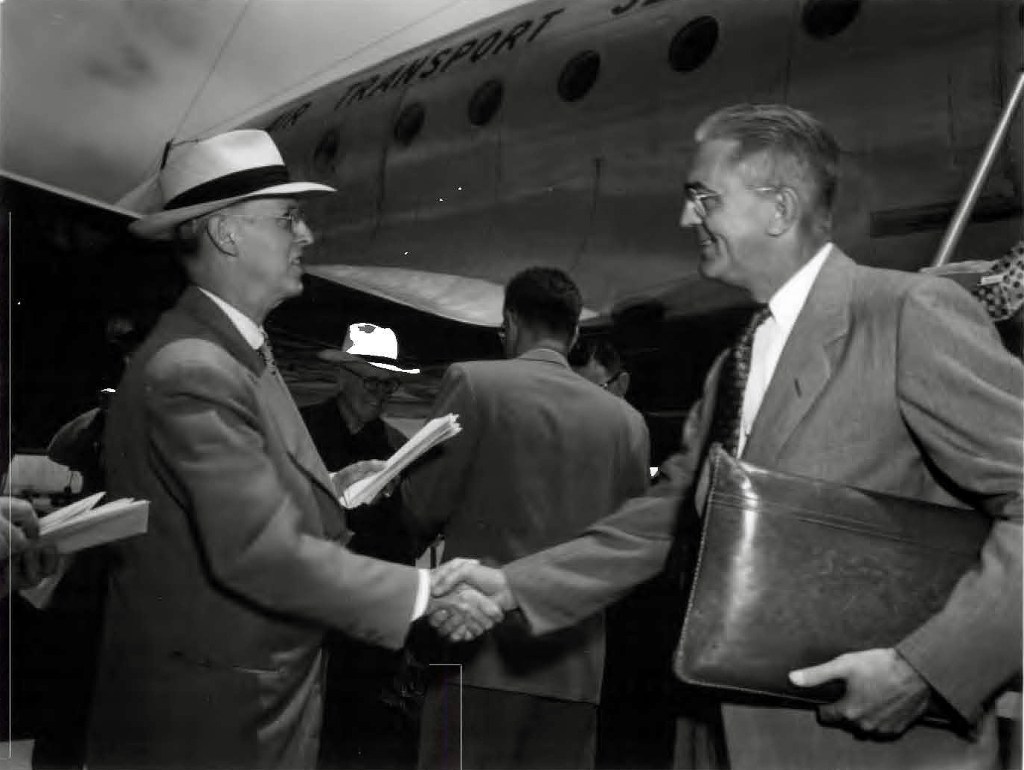 Two men shaking hands.