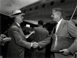 Two men shaking hands.