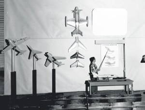 Man pointing at exhibit.