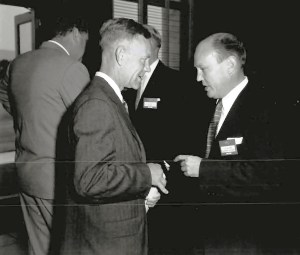 Two men talking.