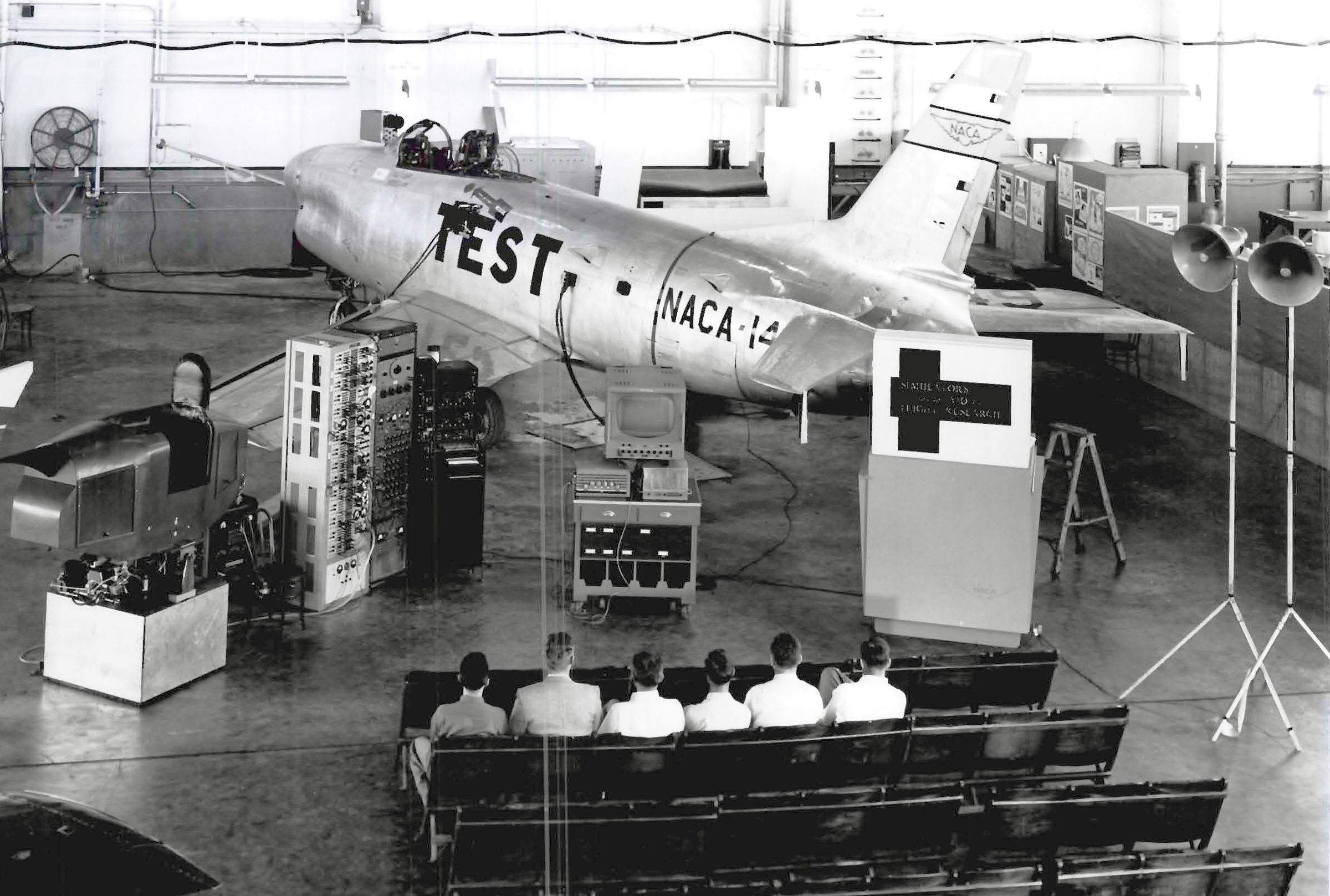 Aircraft in hangar.
