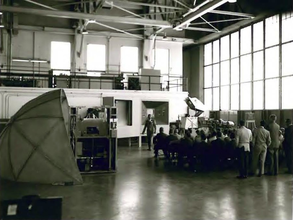 Group in hangar.