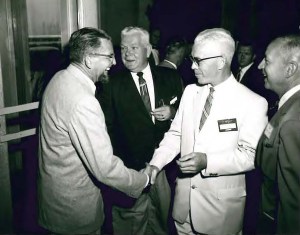 Two men shaking hands.