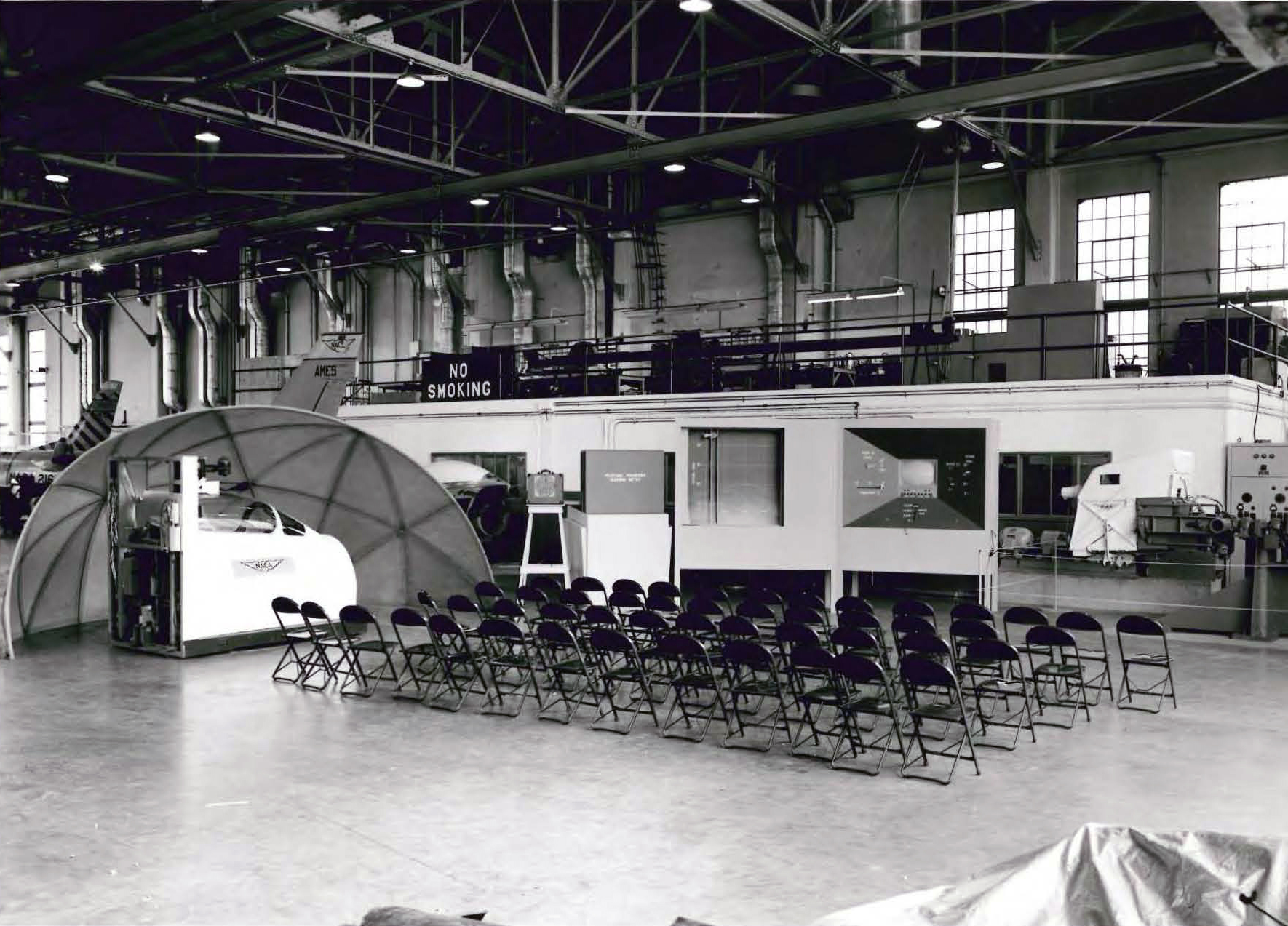 Empty chairs by exhibit.
