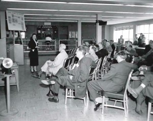 Woman speaking to group.