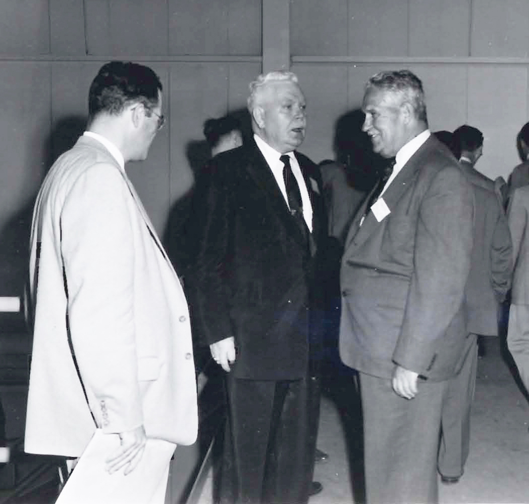 Two men talking.